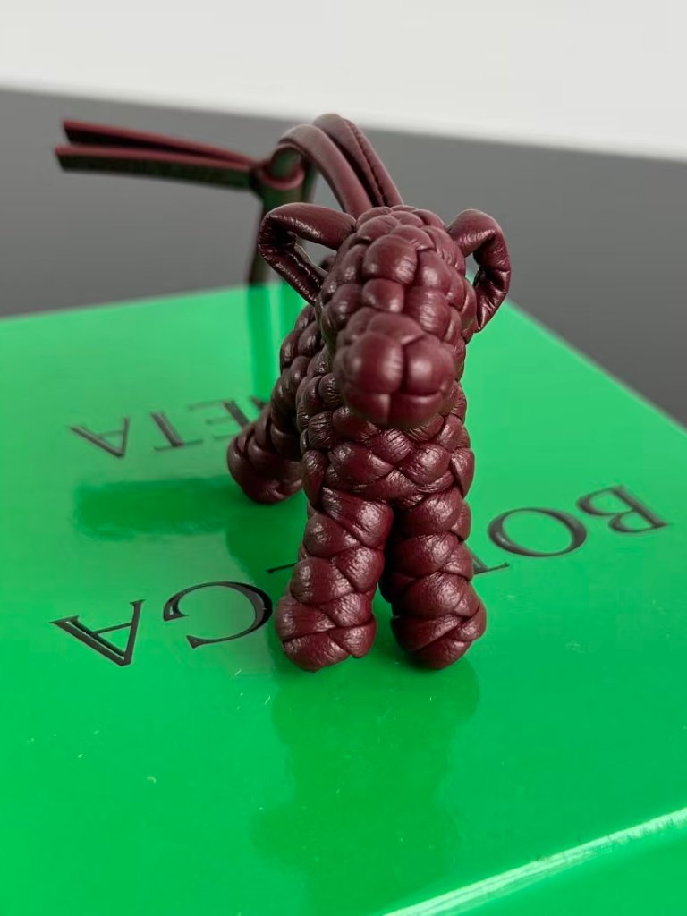 Bottega Veneta Intrecciato Leather Dog Charm 265$